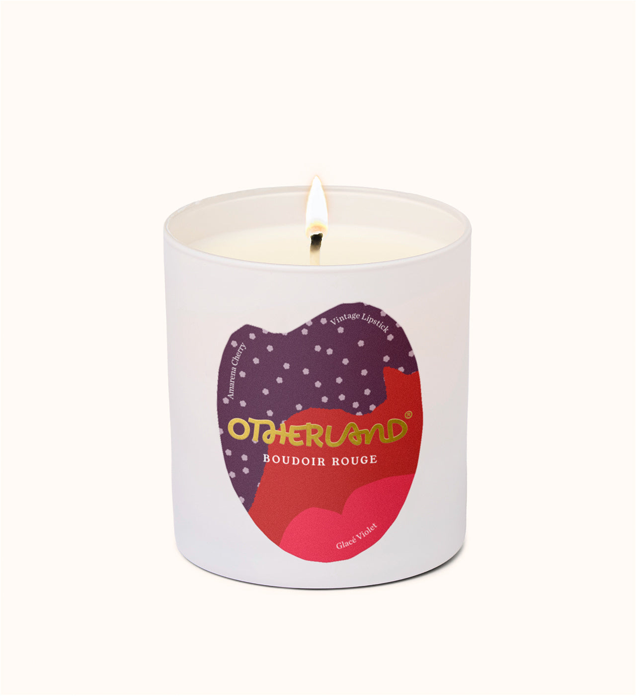 Candle in a white container with a colorful label on a white background