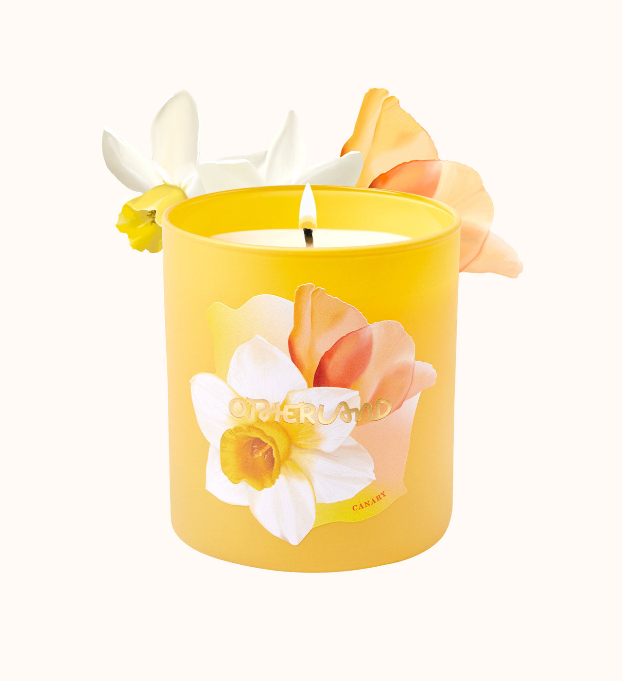Yellow candle with floral design on a white background