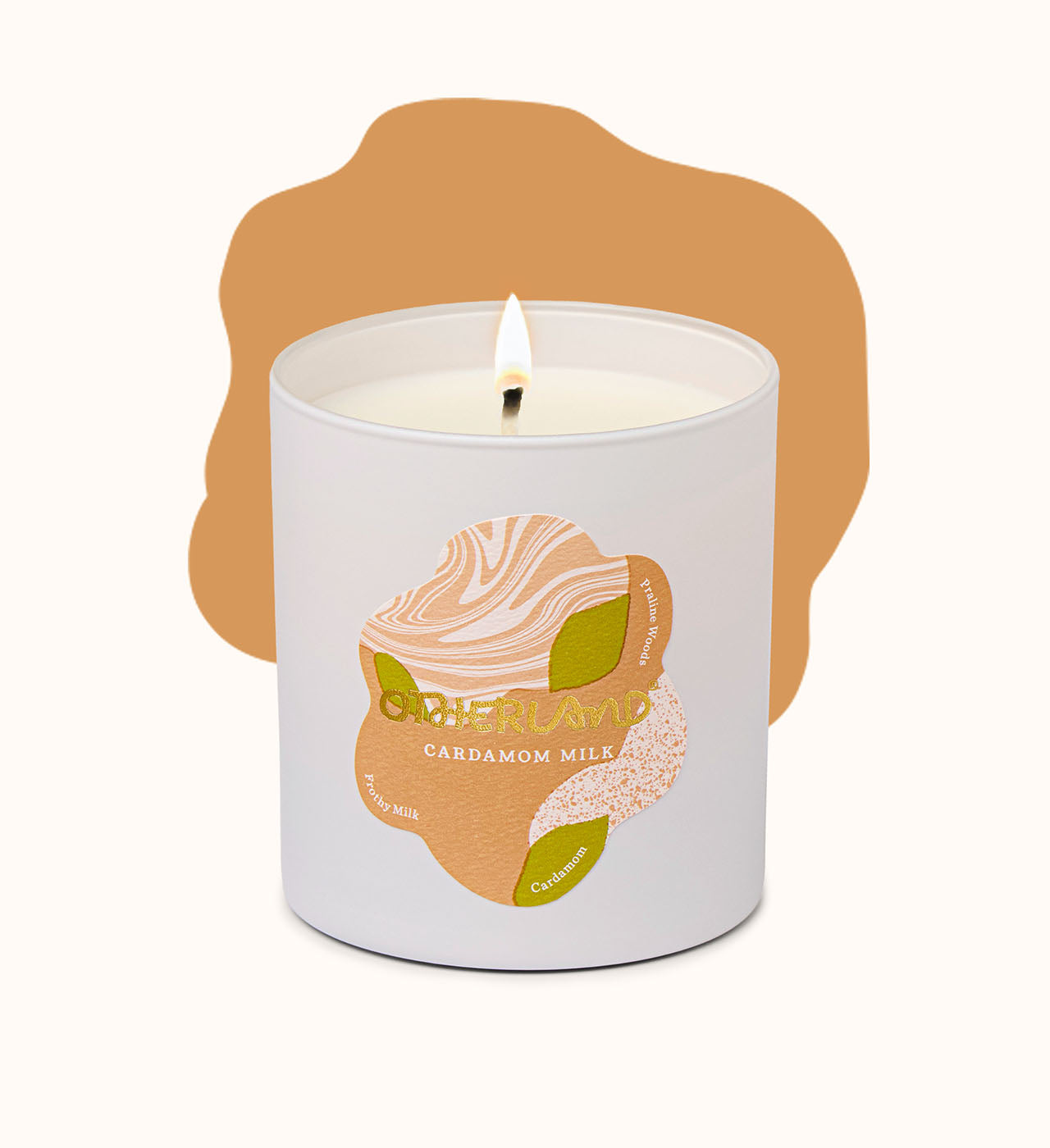 Candle in a white container with a label featuring an illustration of cardamom pods on a white background.