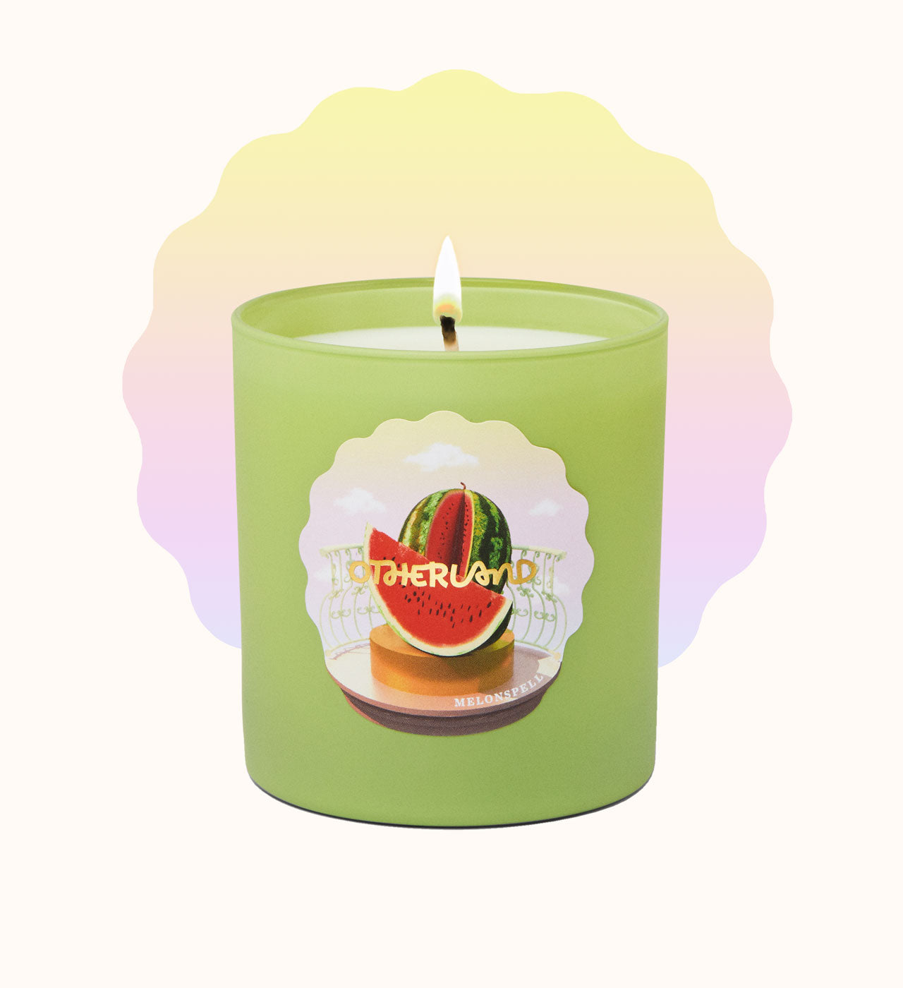 Green candle with watermelon design on a white background