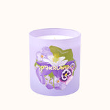 Lavender candle with floral design and 'Otherland' branding on a white background